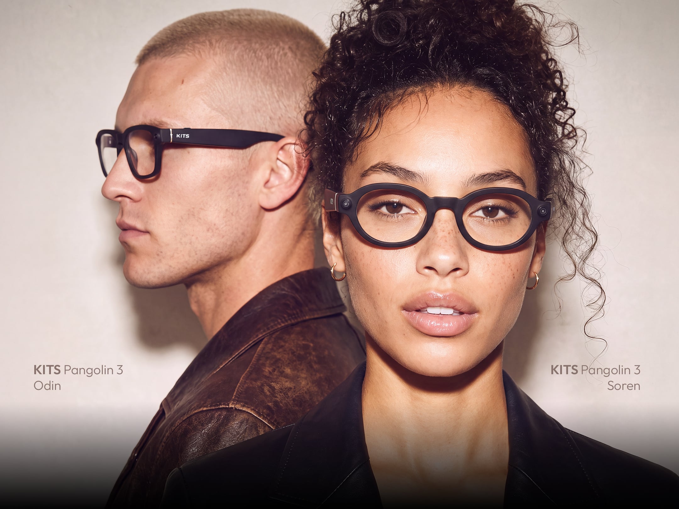 Two people wearing KITS summer eyewear in a car