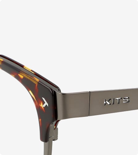 Hybrid acetate and stainless steel frame construction.
